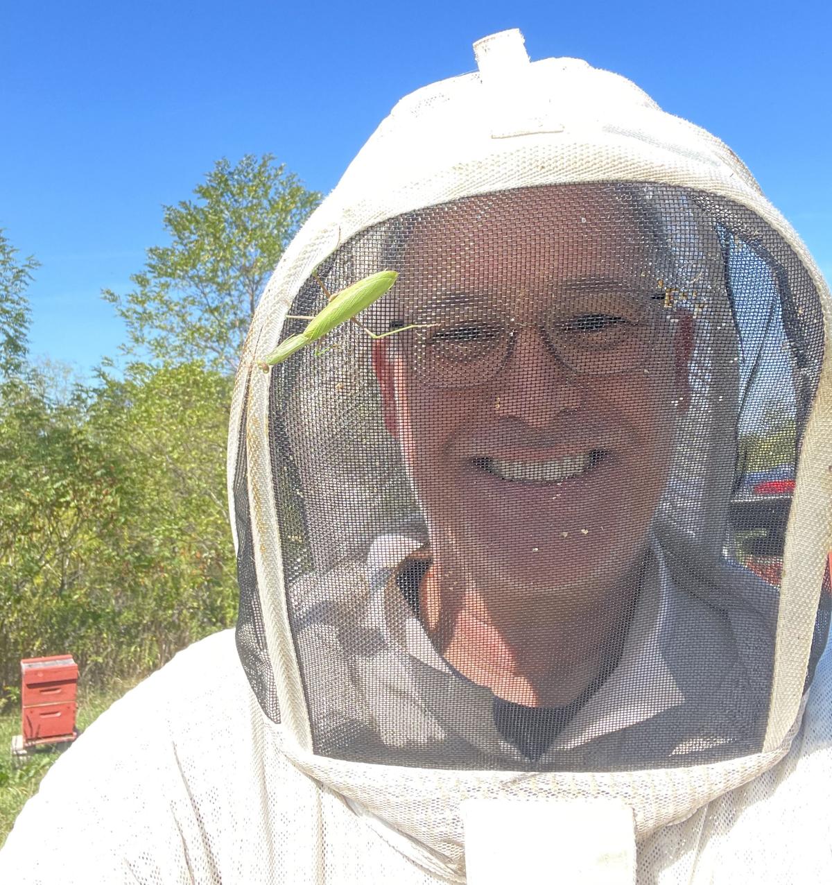 Howard Mincone in beekeeping suit