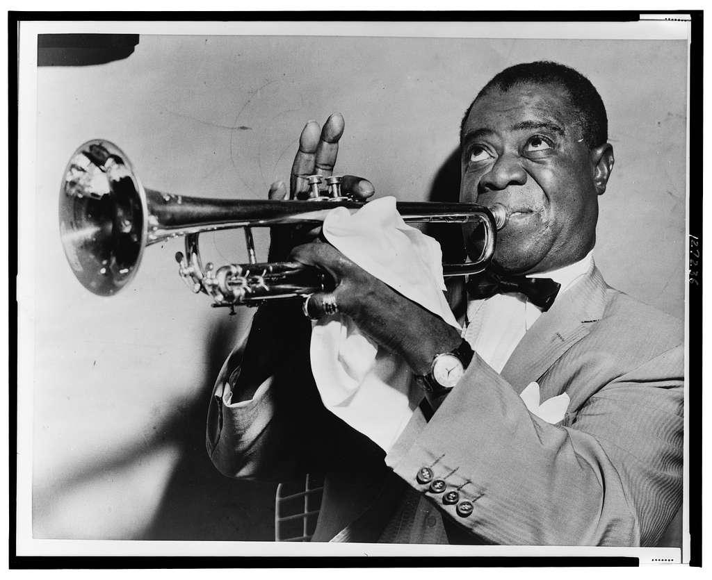 Louis Armstrong playing trumpet